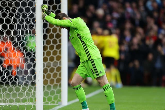 David De Gea reacts after conceding Watford's first goal in their win over Manchester United