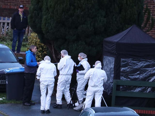 Police forensics officers at a scene in Hazel Way, Crawley Down