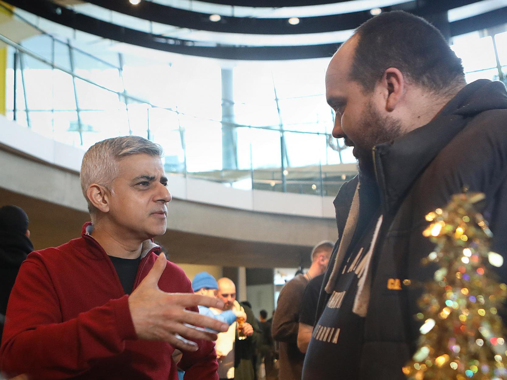 Sadiq Khan welcomes homeless people to City Hall for haircuts and three-course meals