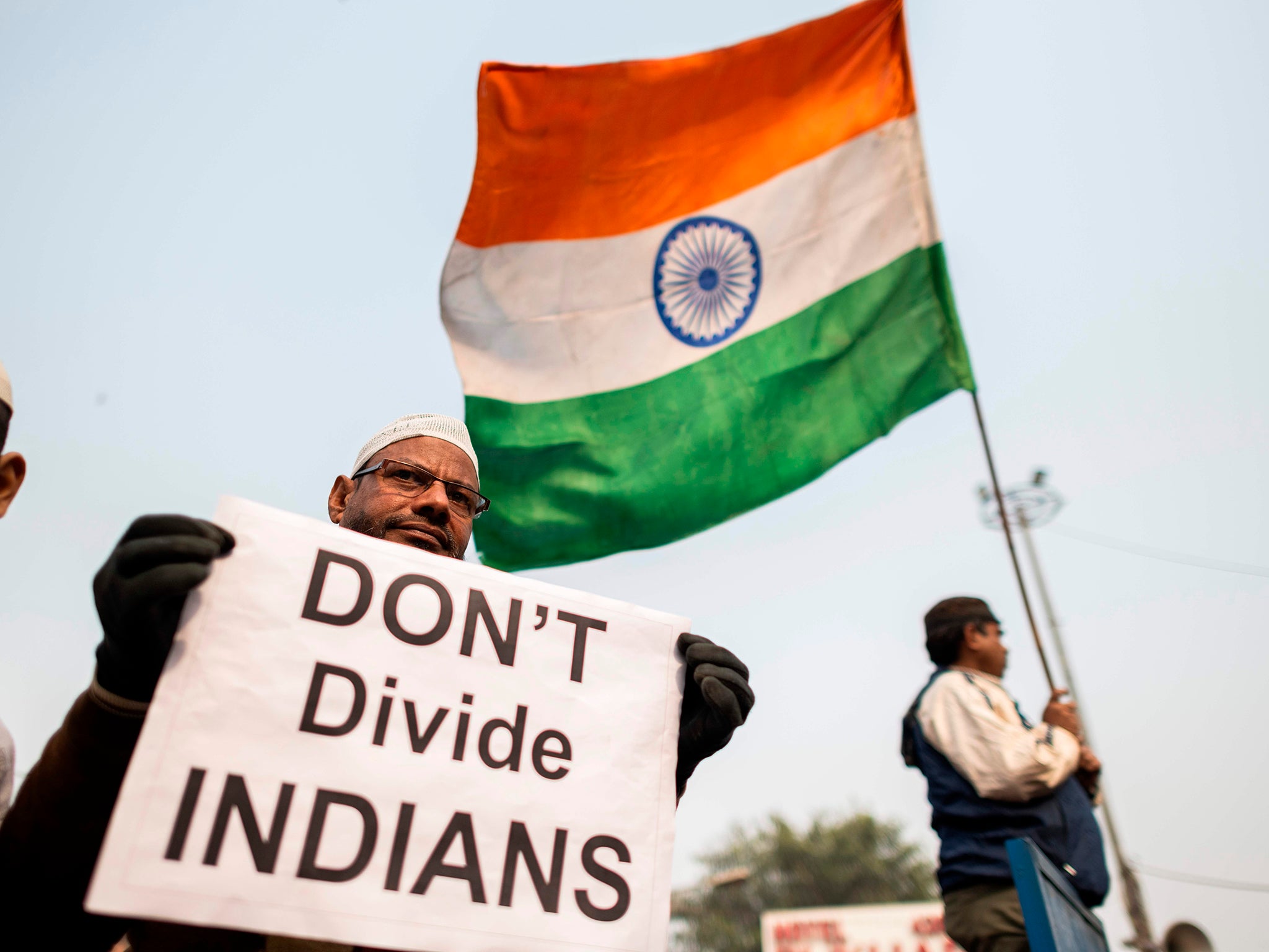 A protester displays a placard during a demonstration (AFP/Getty)