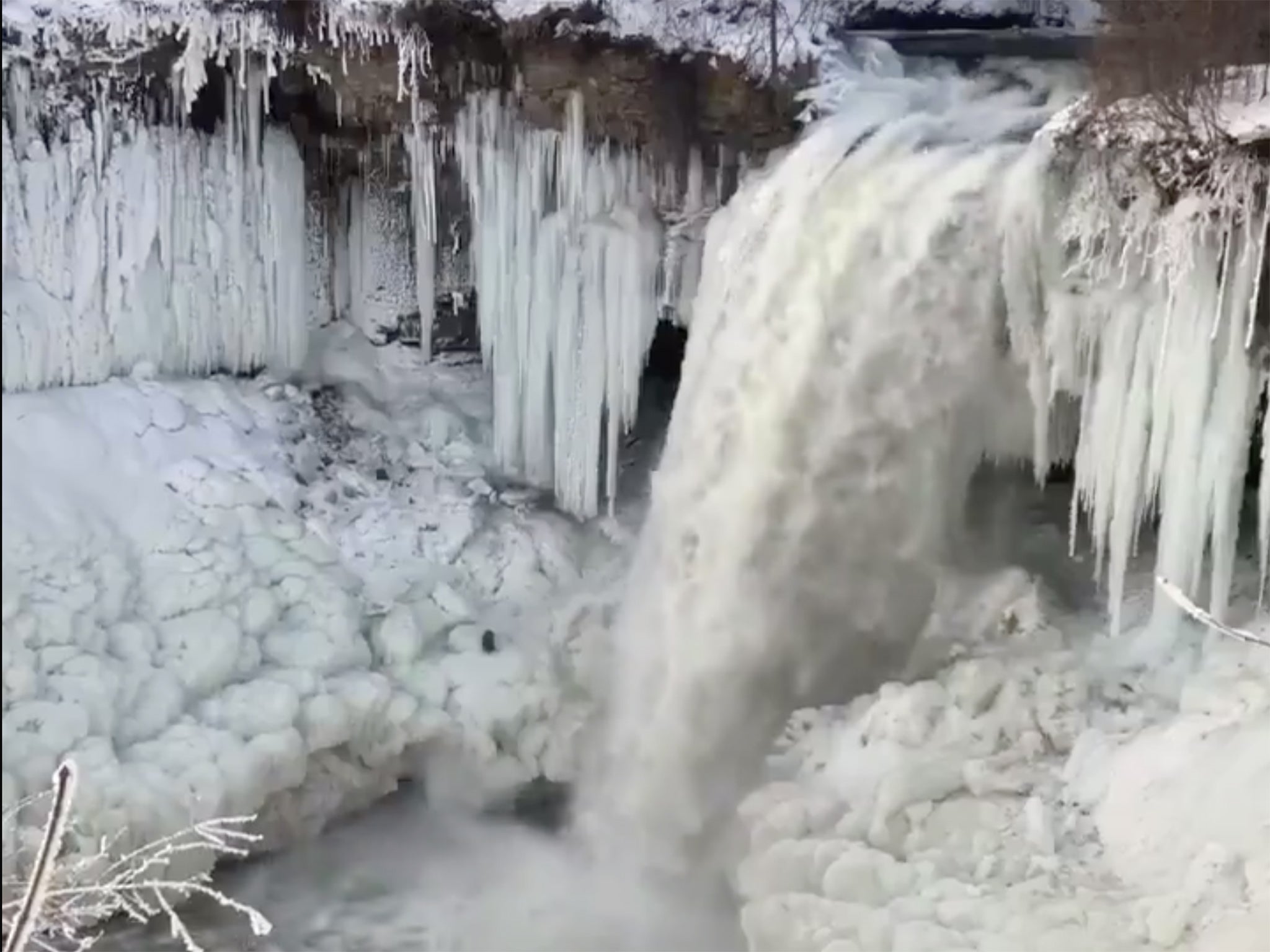 A waterfall in Minnesota has almost frozen over, and the results are magical