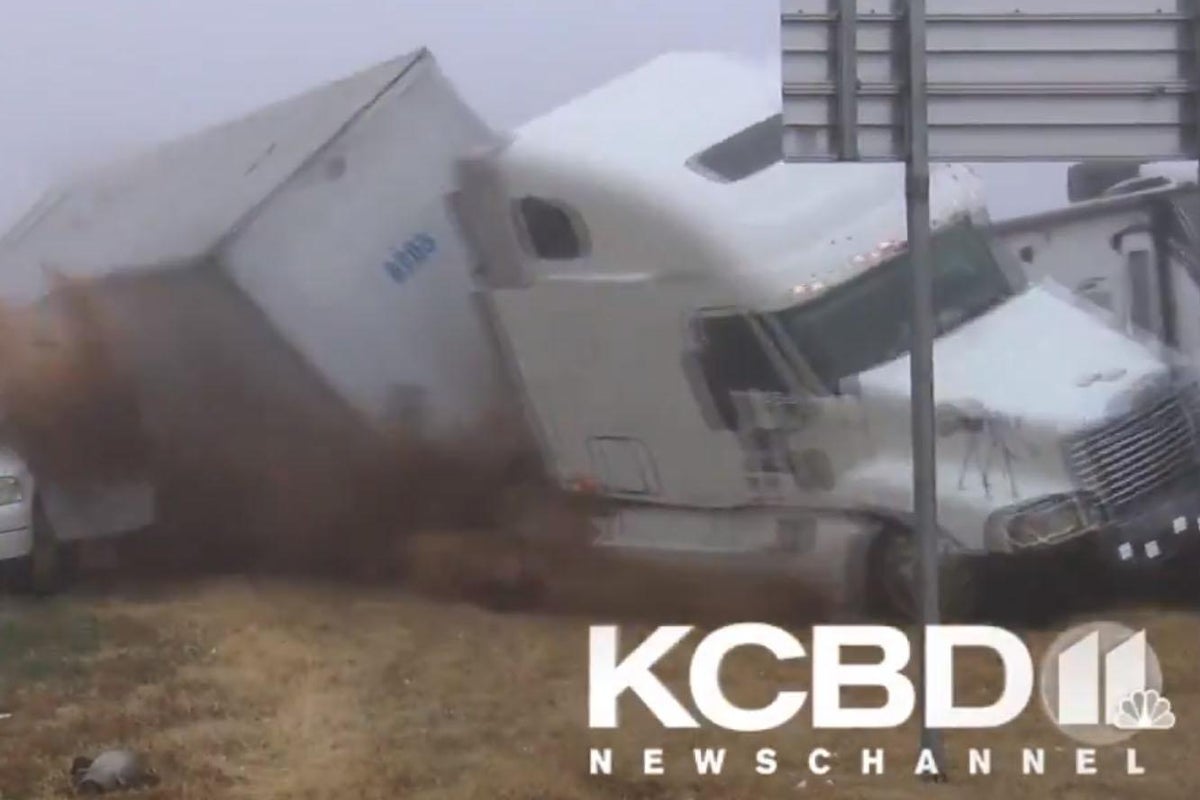 Video shows terrifying moment truck loses control and crashes into ...