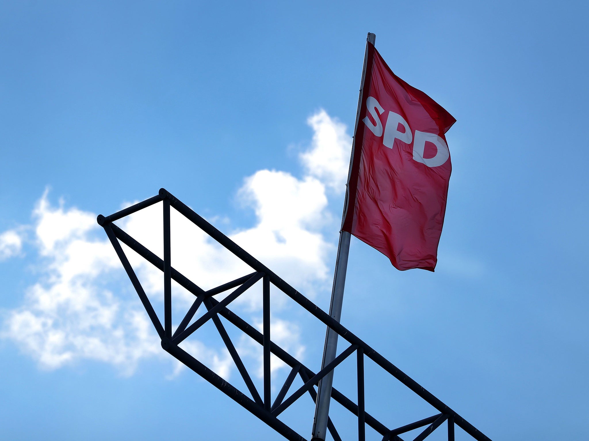 A flag flies over the Social Democrat Party (SPD) headquarters in Berlin