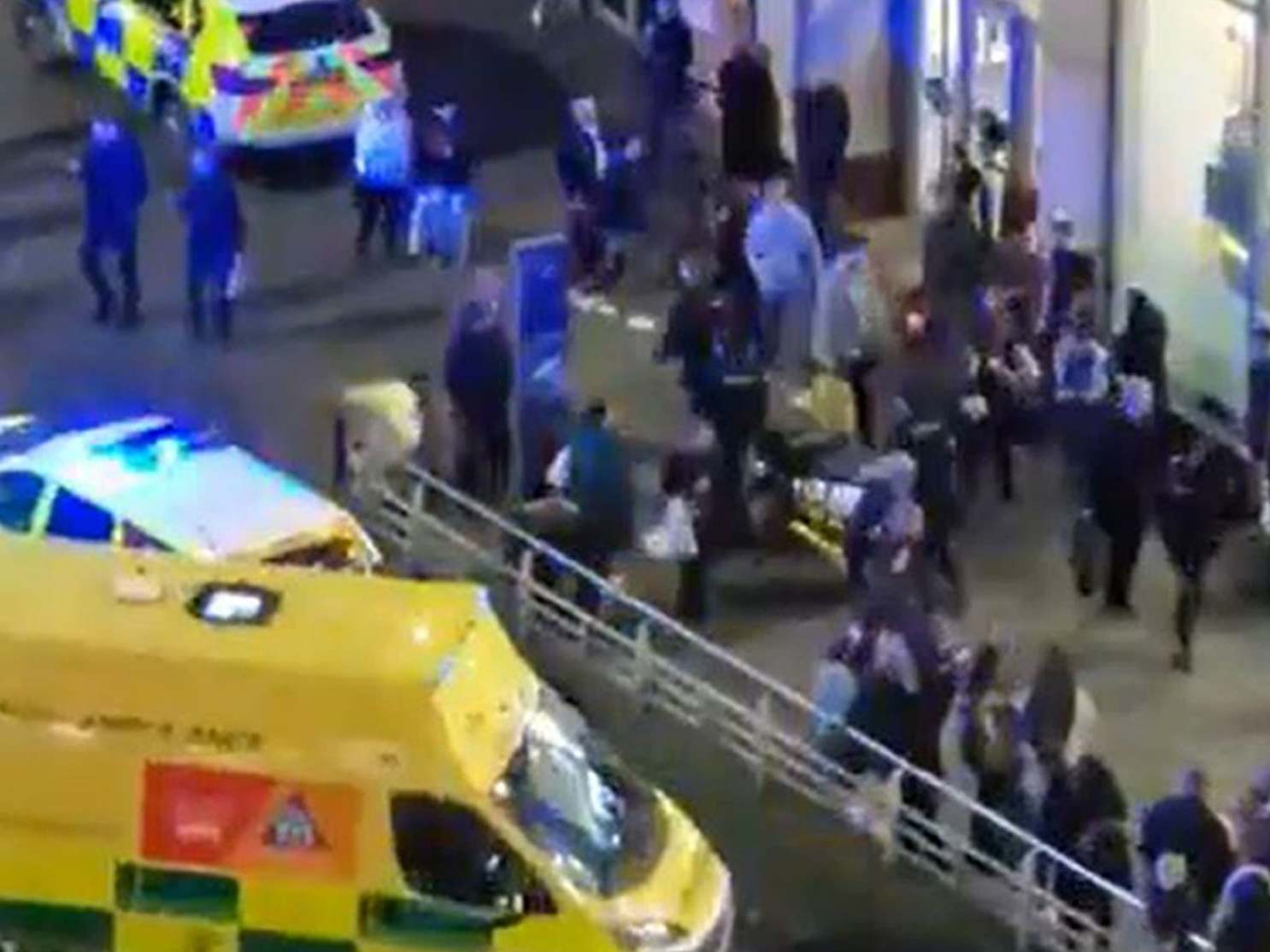 Emergency services outside the Arndale Centre in Manchester after a 16-year-old was repeatedly stabbed
