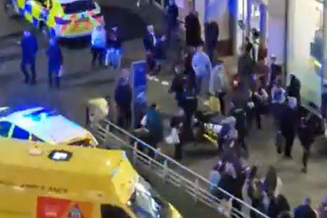 Emergency services outside the Arndale Centre in Manchester after a 16-year-old was repeatedly stabbed