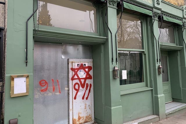The antisemitic graffiti was spotted in north London on Sunday morning