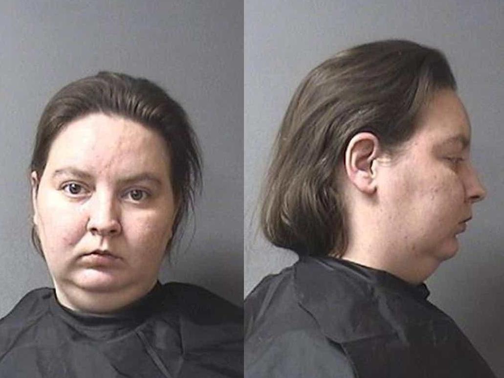Woman arrested after son found inside running washing machine