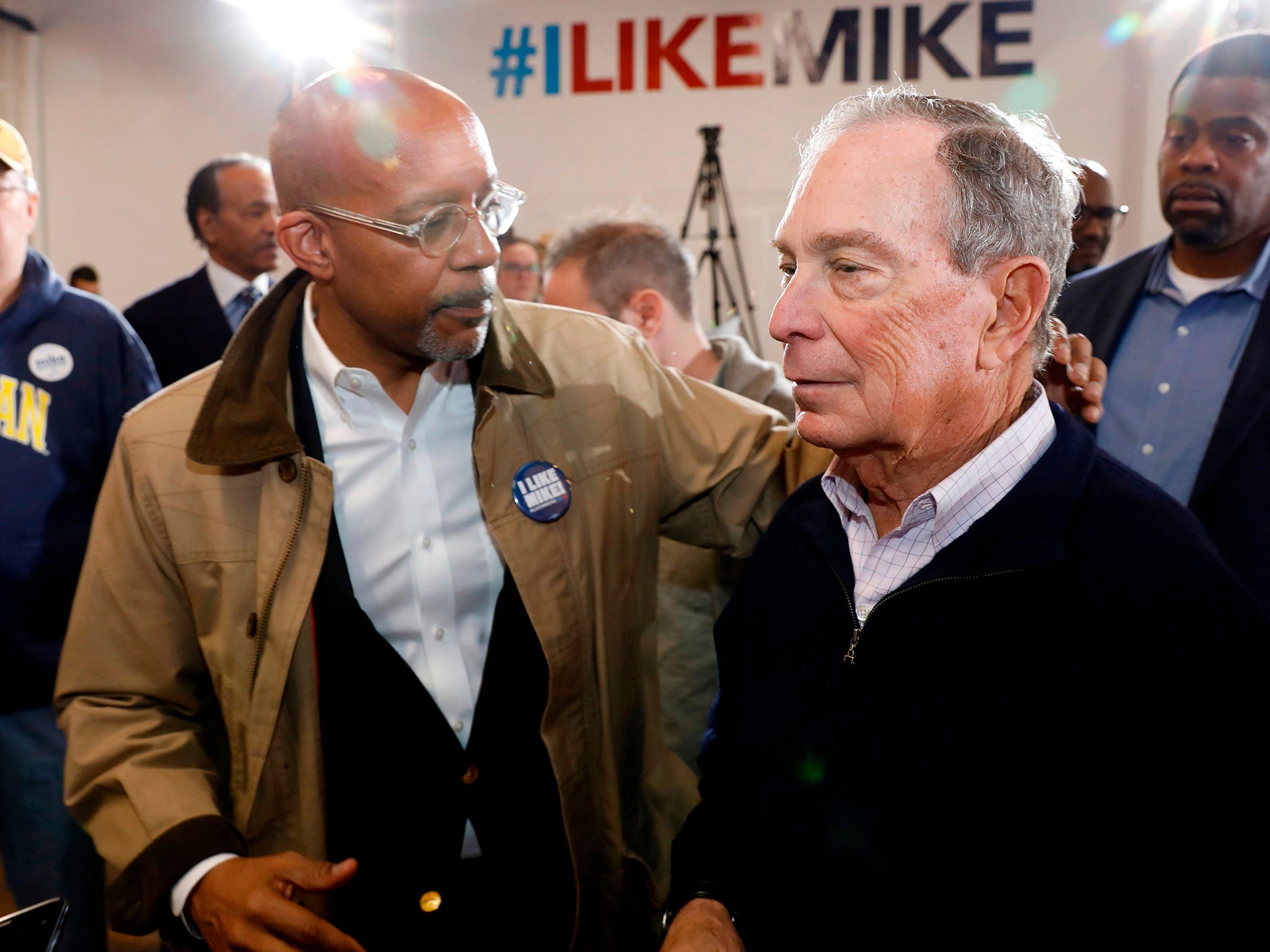 Mr Bloomberg talks to lawyer Melvin Butch Hollowell during an event