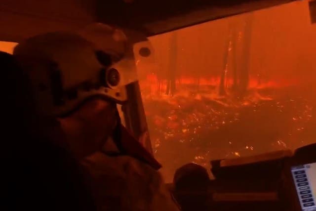 Firefighters in Australia caught on camera the moment their truck was enveloped by a wildfire