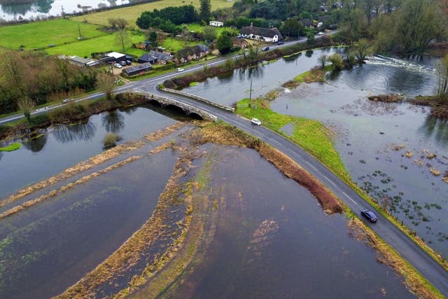 Fields are flooded near Harbridge, 2.5 miles north of Ringwood in Hampshire, after the river Avon burst its banks