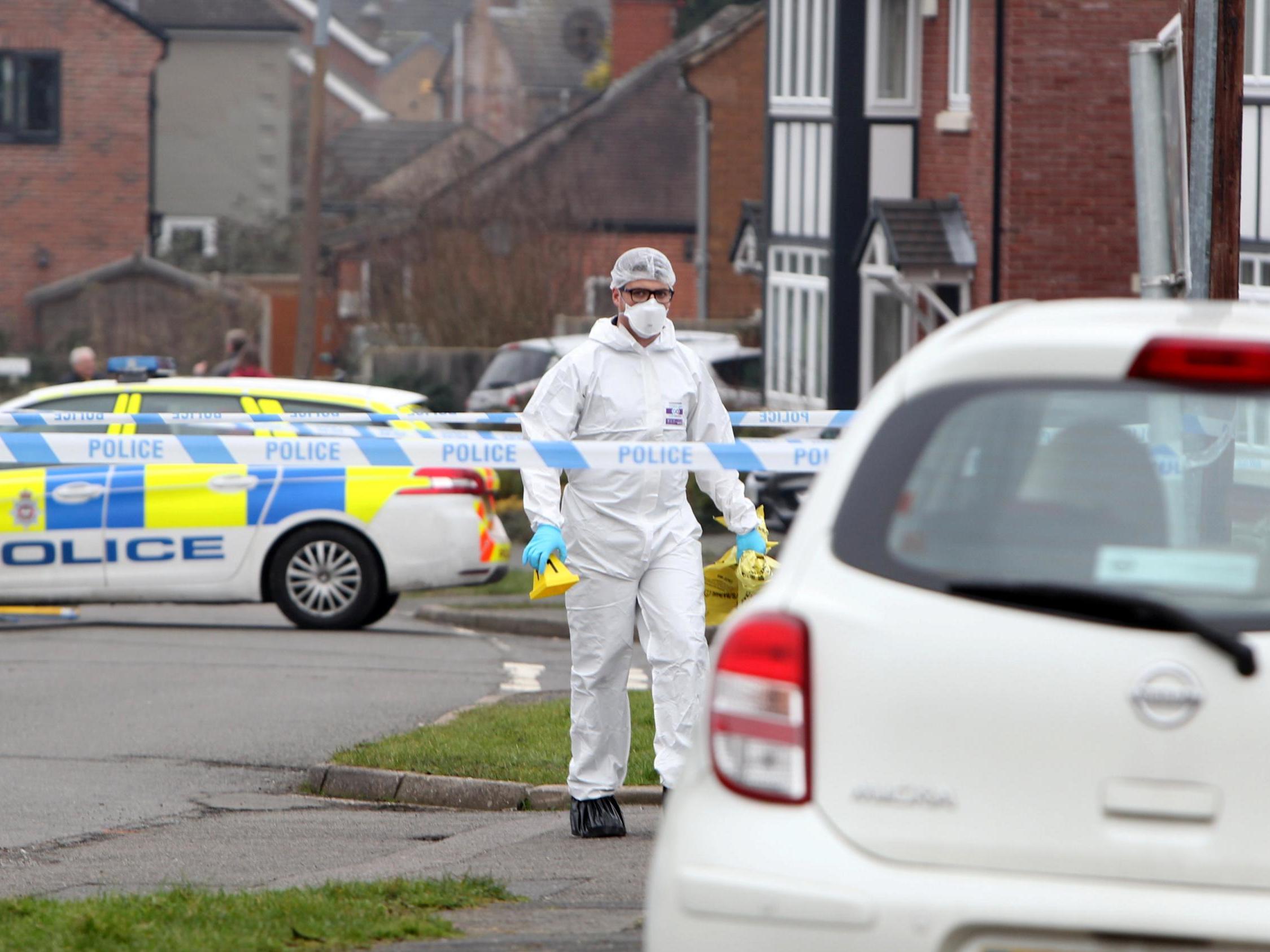 Police forensic officers in New Zealand Lane, Duffield
