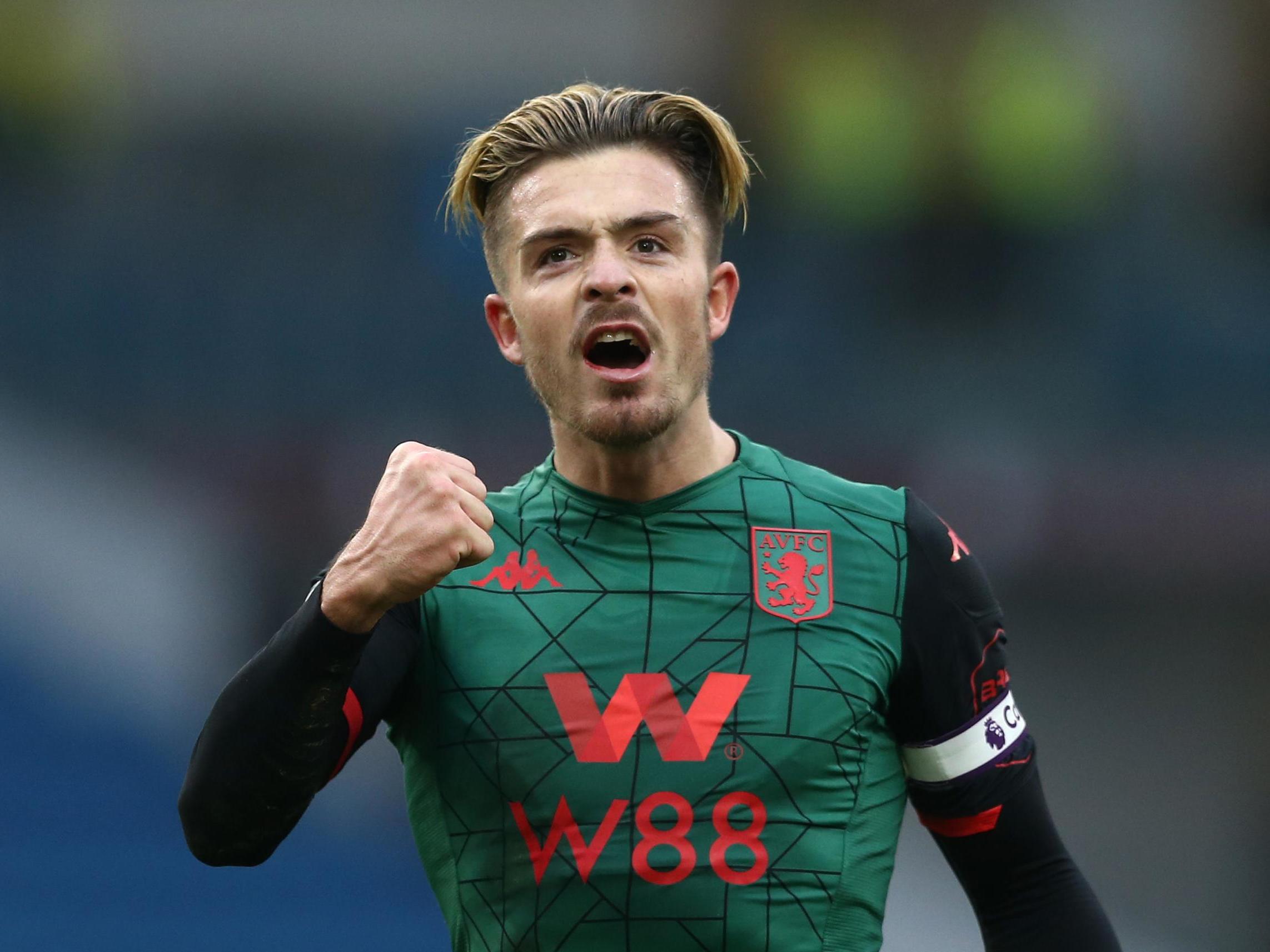 Jack Grealish celebrates after the final whistle at Turf Moor