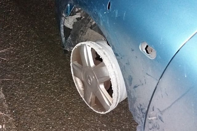 A man was arrested after police discovered his car had no front tyres and that he was almost six times over the legal drink-drive limit while travelling on the M66.