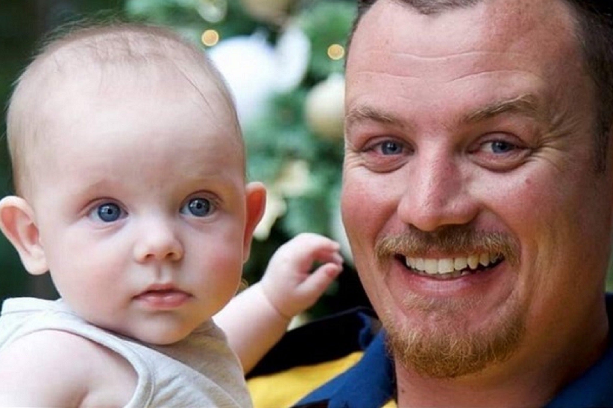 Geoffrey Keaton, 32, deputy captain of Horsley Park Rural Fire Brigade, who was killed on his way to tackle wildfires in New South Wales, Australia, on 19 December, 2019, pictured with his son Harvey.