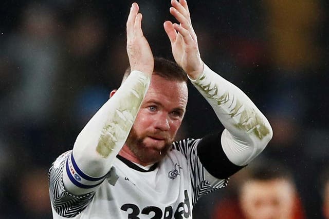 Wayne Rooney applauds the Derby fans