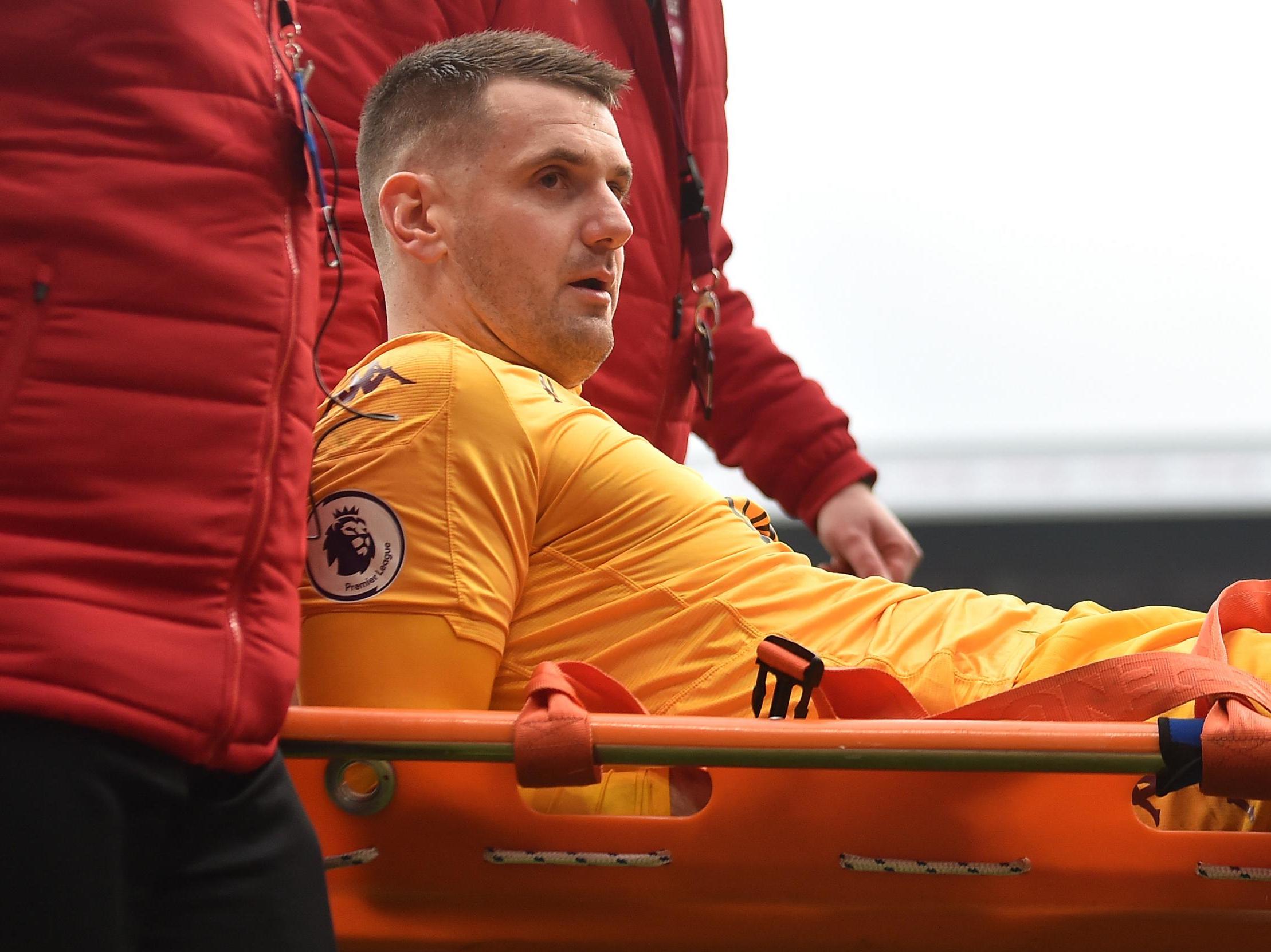 Tom Heaton leaves the pitch on a stretcher after being injured against Burnley