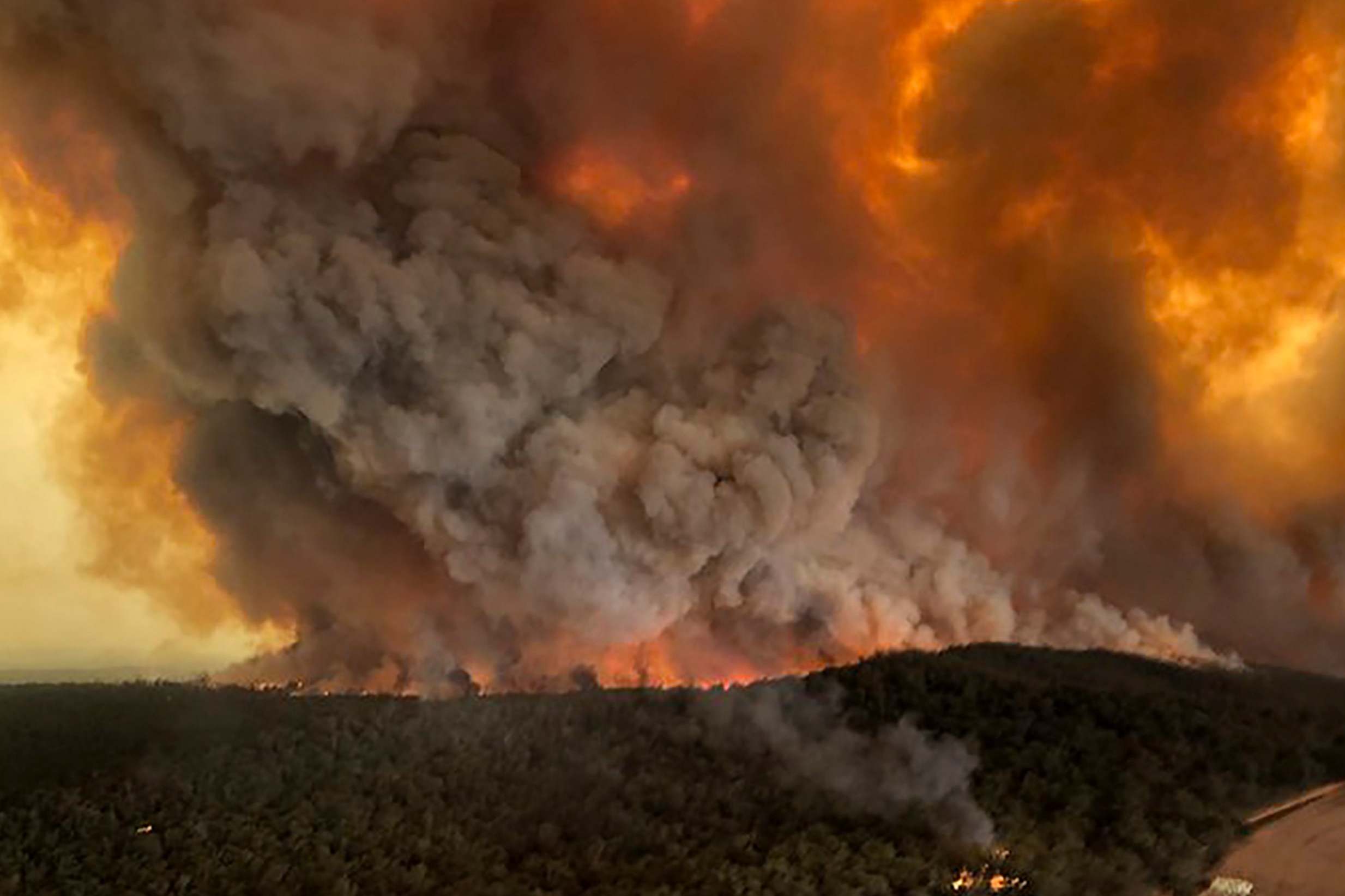 Wildfire rage under plumes of smoke in Bairnsdale, Australia