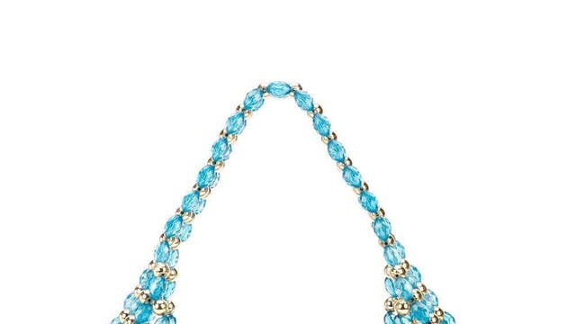 Shrimps, Quinn Beaded Tote, was £720 £180, <a href="https://www.farfetch.com/uk/shopping/women/shrimps-quinn-beaded-tote-item-14569201.aspx?storeid=9580" target="_blank" rel="nofollow" class="body-gallery" data-vars-item-name="GL-9312611-https://www.farfetch.com/uk/shopping/women/shrimps-quinn-beaded-tote-item-14569201.aspx?storeid=9580" data-vars-event-id="c6">Farfetch</a>