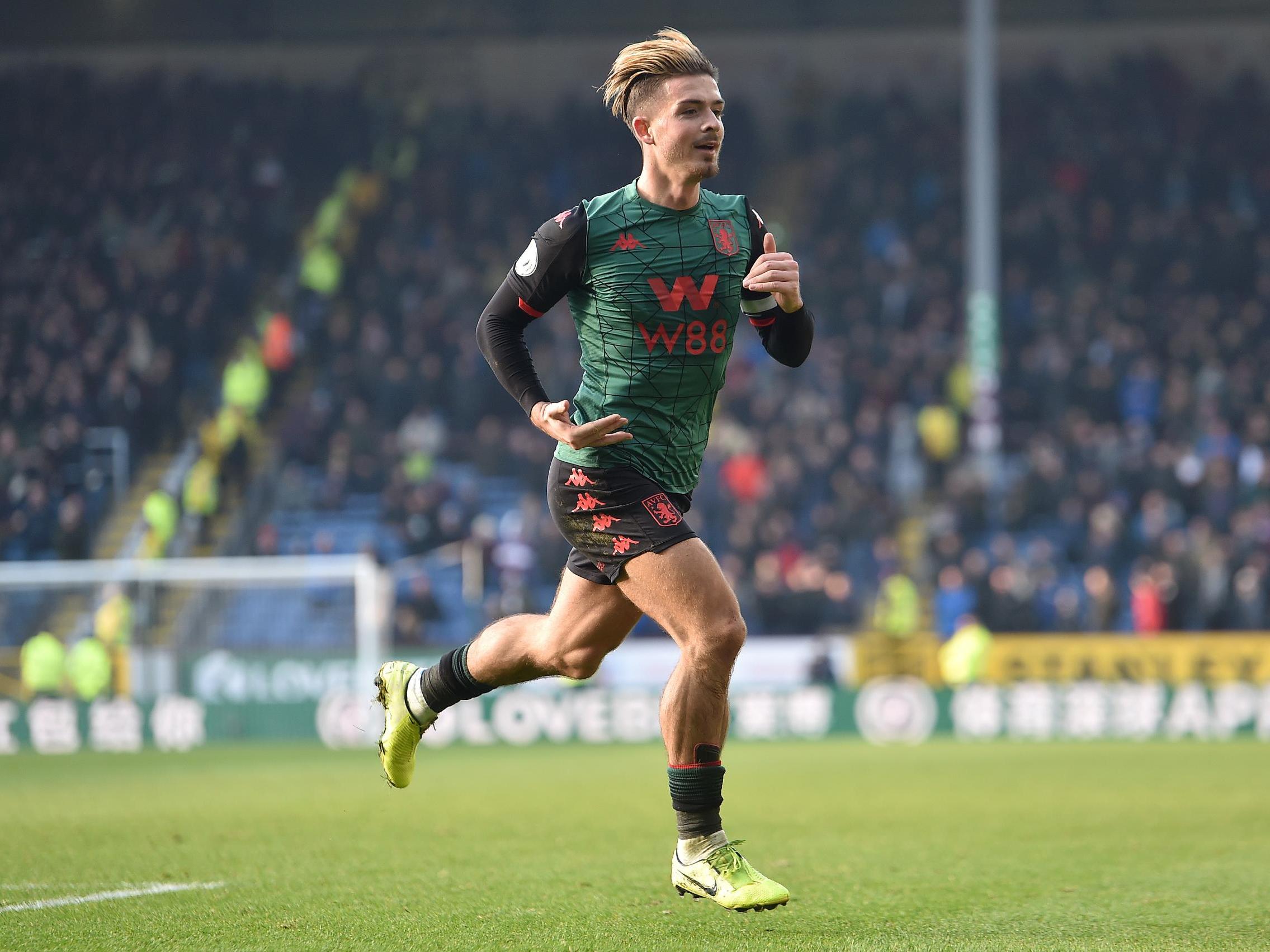 Jack Grealish celebrates after scoring against Aston Villa