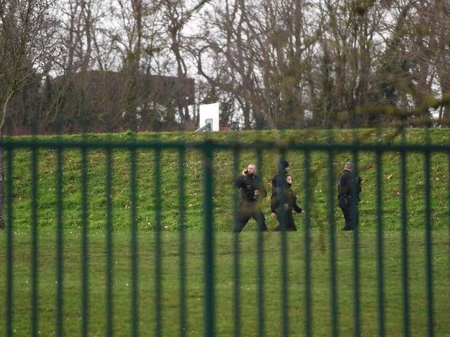 Police officers patrol in a park near Villejuif on 3 January, 2020 where a man was shot and killed by officers after stabbing passers-by.