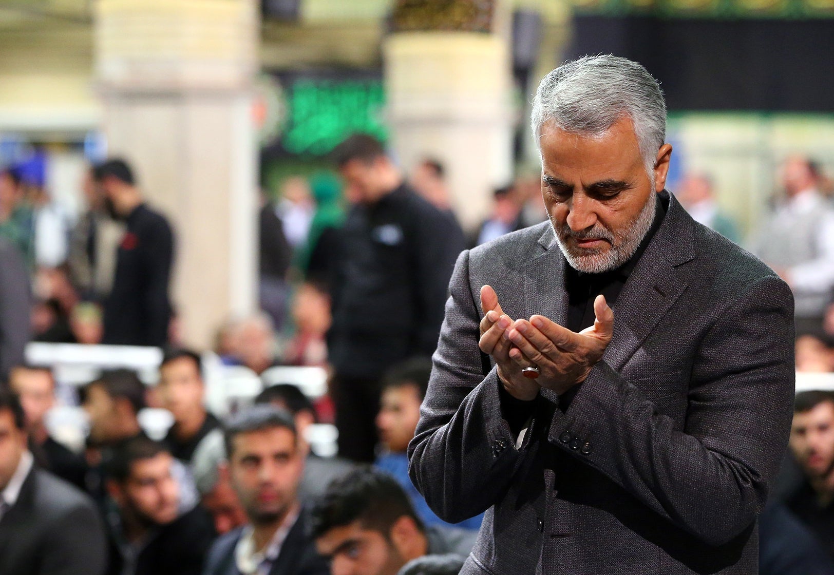 Commander of the Quds Force Qassem Soleimani praying during a religious ceremony in Tehran
