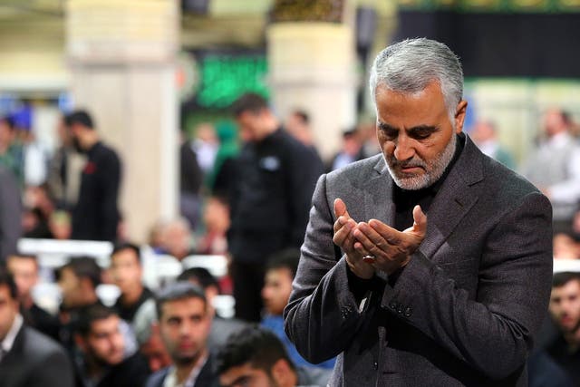 Commander of the Quds Force Qassem Soleimani praying during a religious ceremony in Tehran