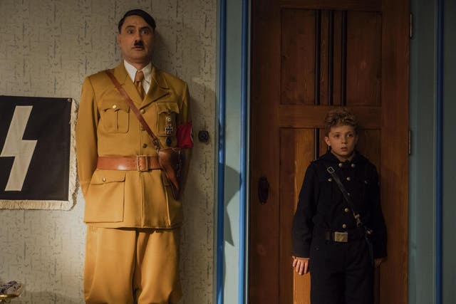 Taika Waititi as Adolf Hitler and Roman Griffin Davis as the titular protagonist in Jojo Rabbit.