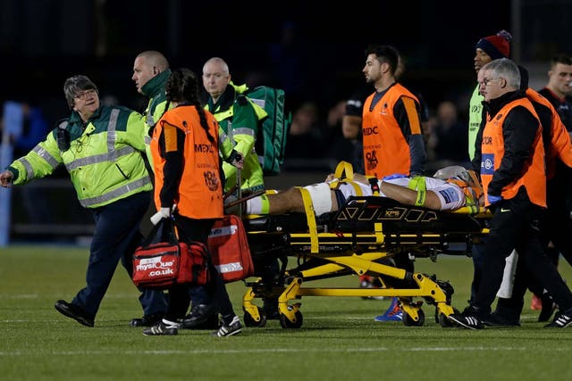 Michael Fatialofa is carried off the field on a stretcher