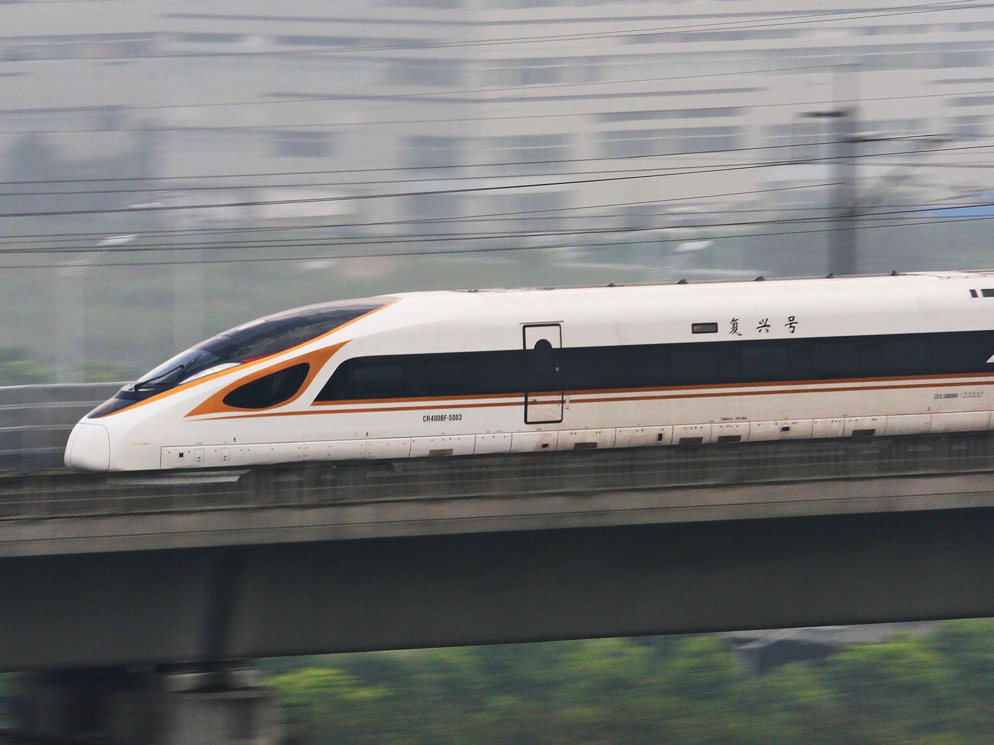 The Fuxing bullet train runs on the Beijing-Shanghai Railway in Changzhou (AFP/Getty)