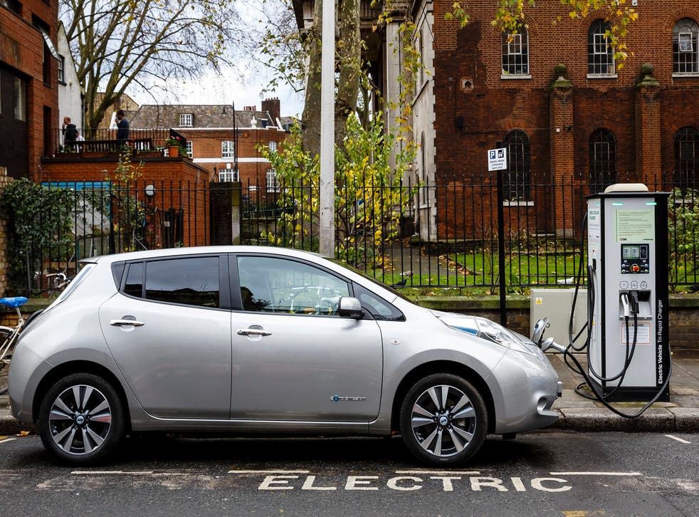Go Ultra Low Nissan LEAF on charge on a London street