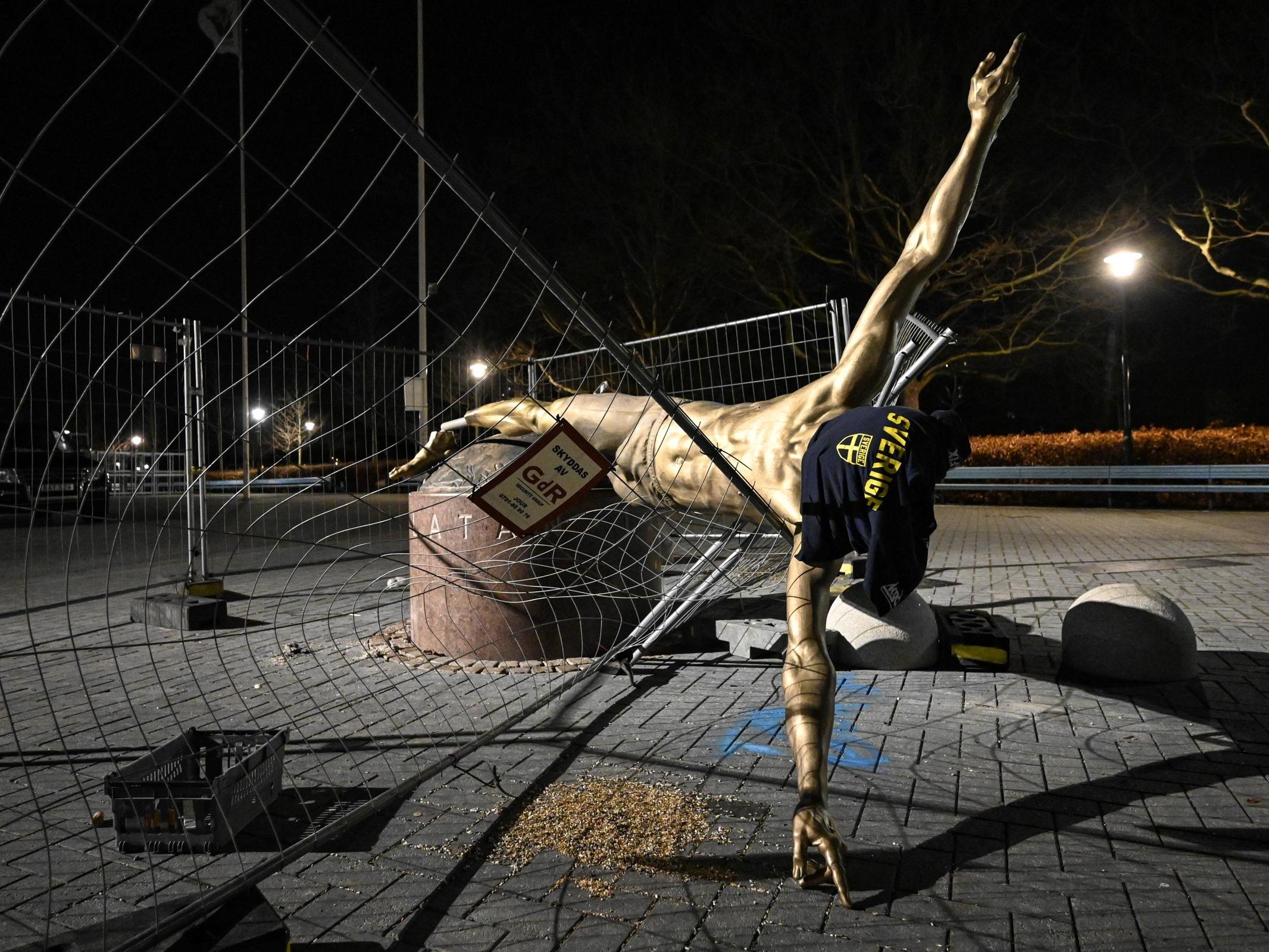 The damaged statue of soccer player Zlatan Ibrahimovic next to Stadion football arena in Malmo, Sweden