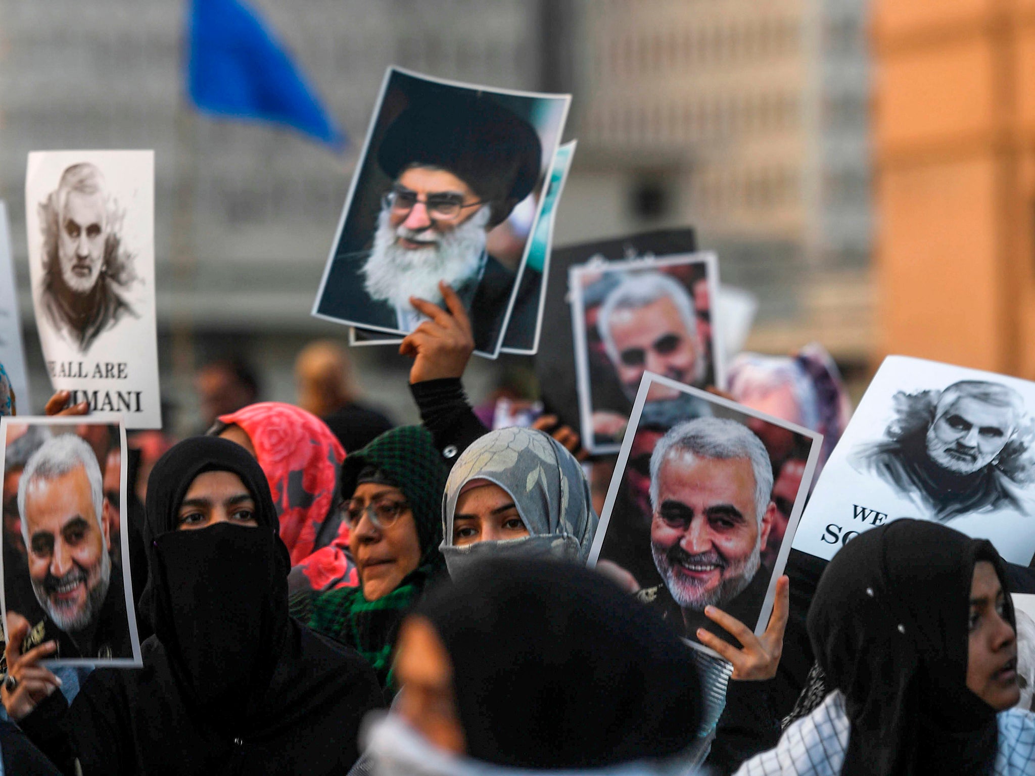 Shia Muslims march to protest against the US airstrike that killed Soleimani