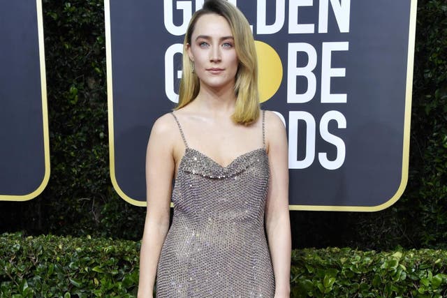 Saoirse Ronan arrives on Golden Globes red carpet