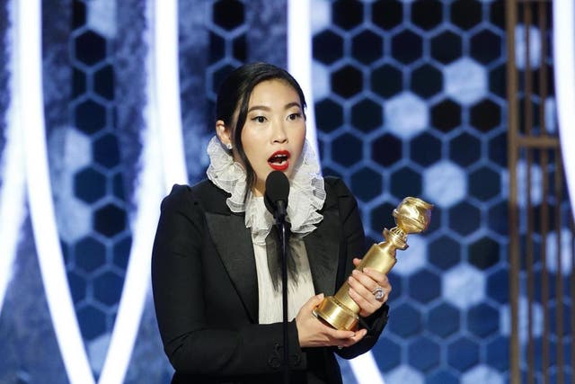 Awkwafina onstage at the Golden Globes 2020