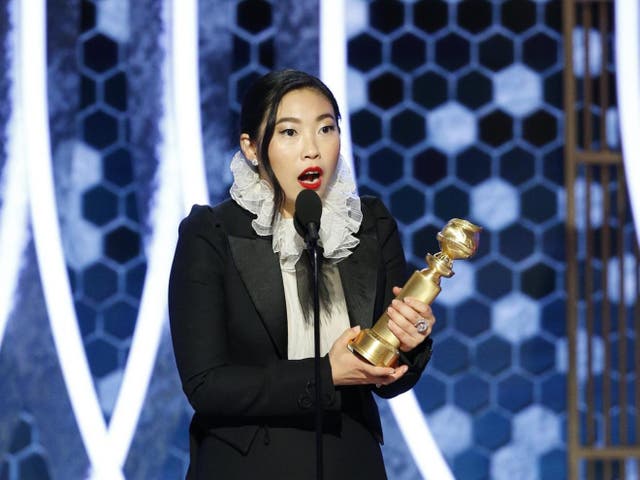 Awkwafina onstage at the Golden Globes 2020