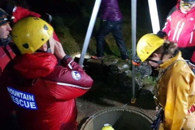 Rescuers descend into the Three Counties cave network to search for the missing man