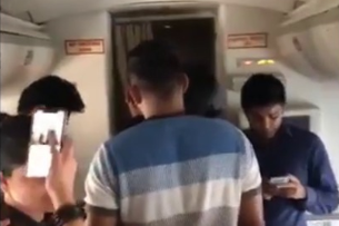 Passengers on a delayed Air India flight demanded that the captain come out