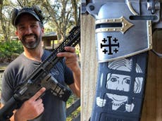 Trump Jr poses with gun featuring image of Hillary Clinton behind bars