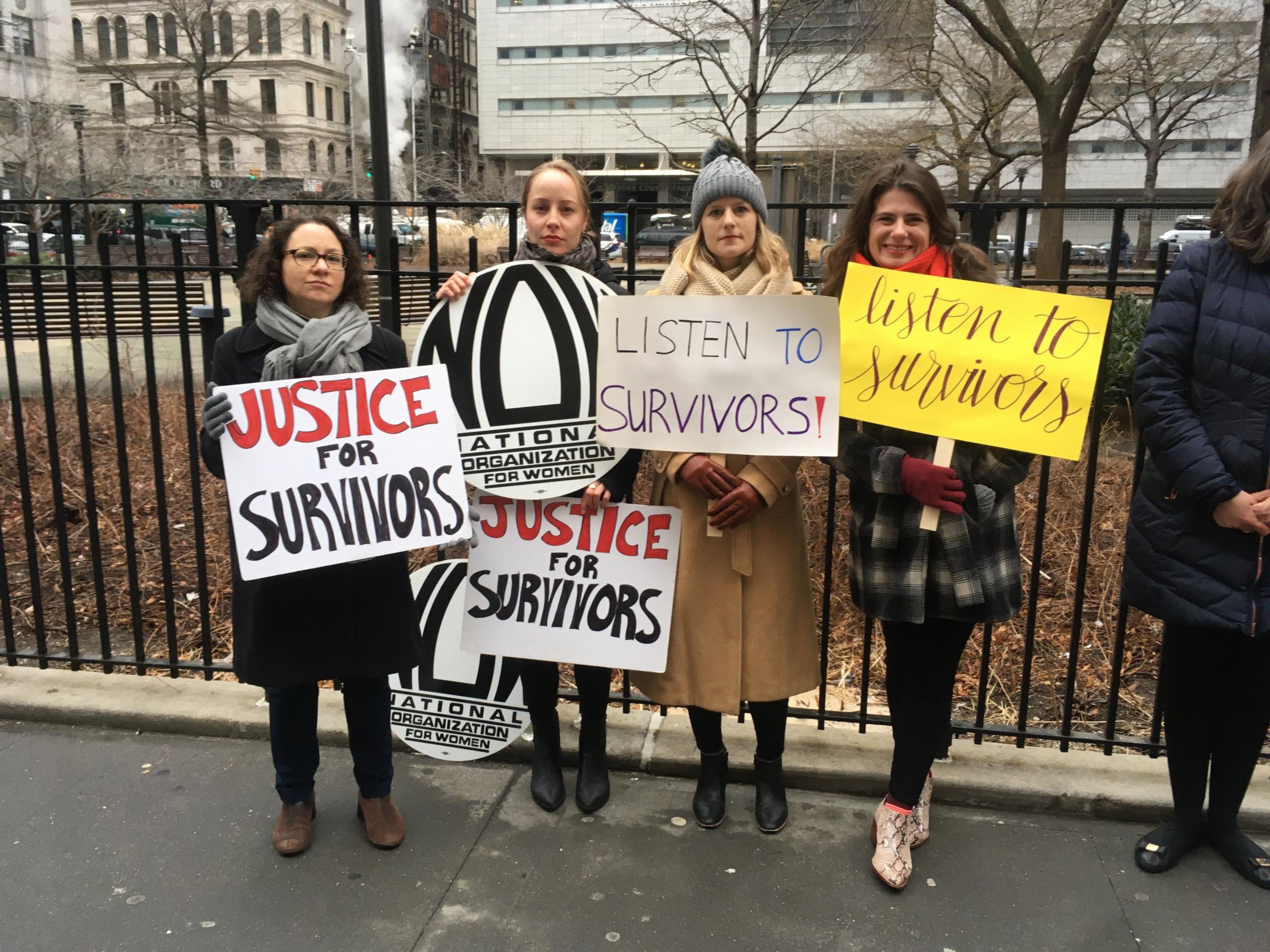 Protesters outside the trial of Harvey Weinstein in New York