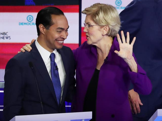 Julian Castro and Elizabeth Warren embrace after the first Democratic presidential debate on 26 June 2019 in Miami, Florida