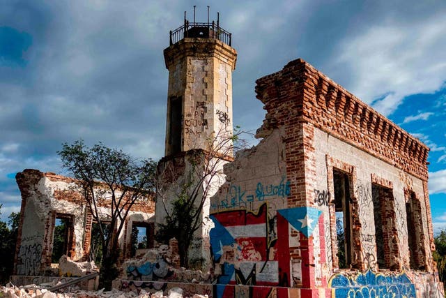 The collapsed wall of the ruins of an iconic landmark lighthouse is seen in Guanica, Puerto Rico