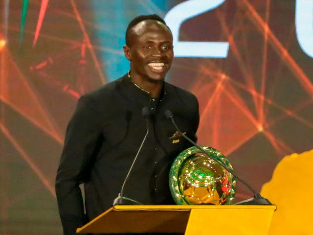 Sadio Mane makes a speech after receiving his award