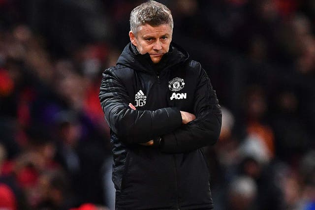 Ole Gunnar Solskjaer cuts a forlorn figure on the sidelines during Manchester United's defeat by Man City