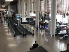 Airport workers arrested for letting passengers skip quarantine