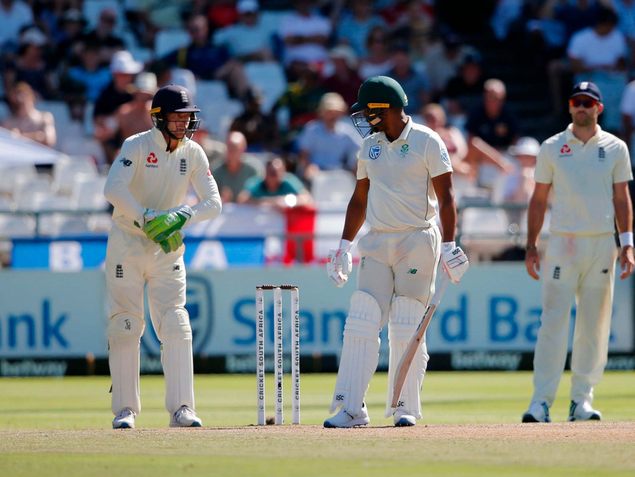 Jos Buttler (left) was fined for his comments to Vernon Philander in the second Test