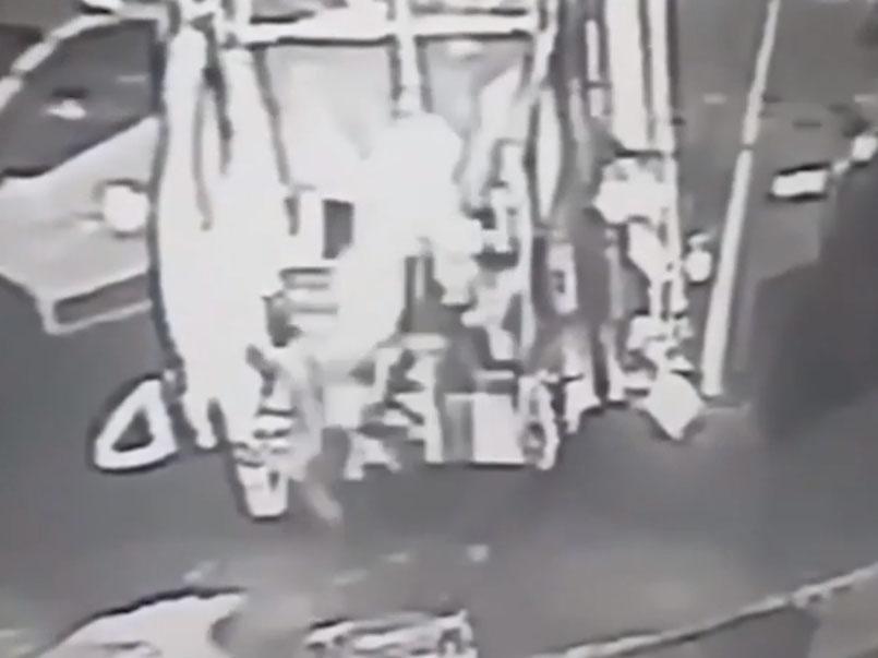 Video has emerged of a binman who was nearly crushed after he was pulled into the back of refuse lorry