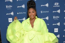 Lizzo volunteers at Australian food bank while on tour: 'This is a global crisis'