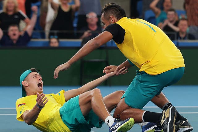 Alex De Minaur and Nick Kyrgios celebrate their victory in the ATP Cup quarter-final over Great Britain