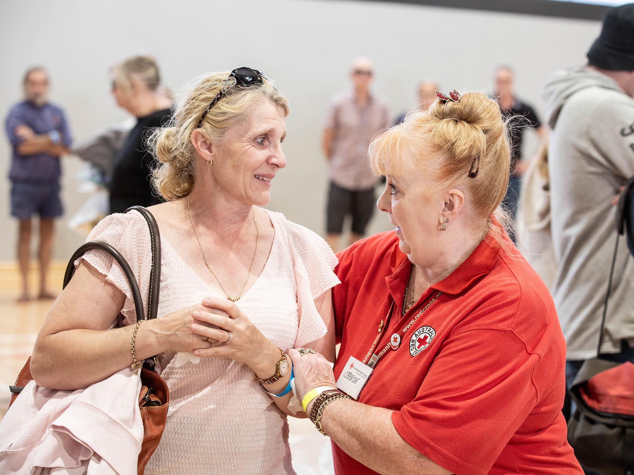 Members of the Australian Red Cross have been volunteering at evacuation centres in crisis-hit areas