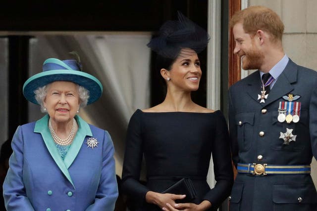 We are not amused: the Queen with the Duke and Duchess of Sussex
